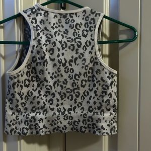 worn during summer to fairs and such. dosnt fit anymore. Animal print crop top.